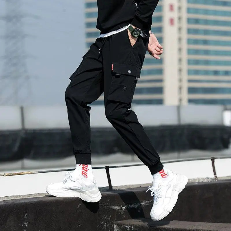 Pantalon Cargo tendance de couleur unie pour hommes, pantalon Cargo à poches multiples à rabat, pantalon d'extérieur ample et décontracté, pantalon de travail surdimensionné pour hommes, nouvelle collection 2025