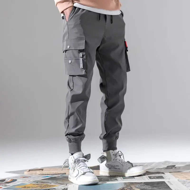 Pantalon Cargo tendance de couleur unie pour hommes, pantalon Cargo à poches multiples à rabat, pantalon d'extérieur ample et décontracté, pantalon de travail surdimensionné pour hommes, nouvelle collection 2025