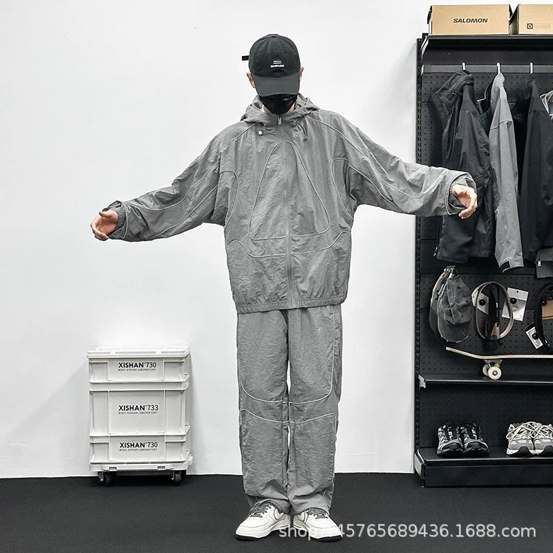 Veste coupe-vent unisexe 2026, manteau ample résistant à l'eau, avec bandes réfléchissantes, fermeture éclair, style vintage streetwear long